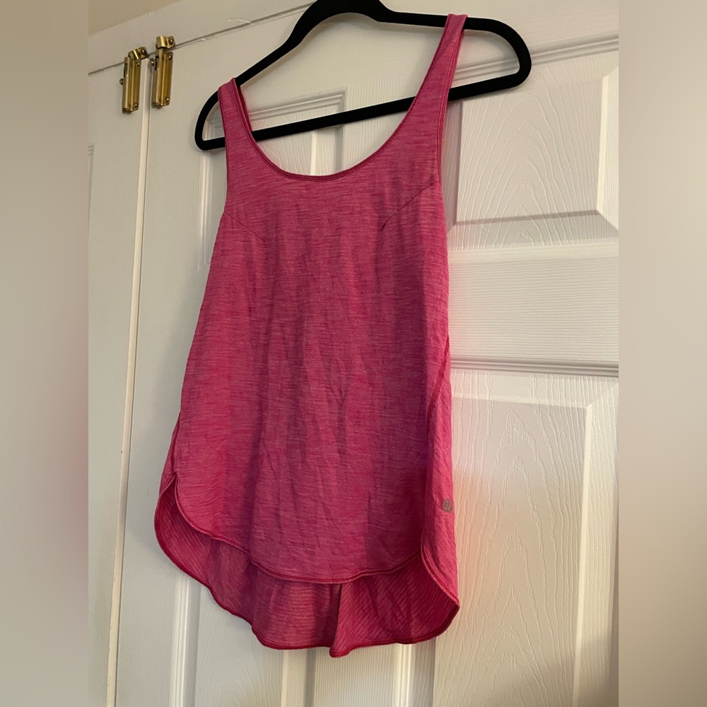 Lululemon Pink Tank Top (see pics for measurements) fits like a medium